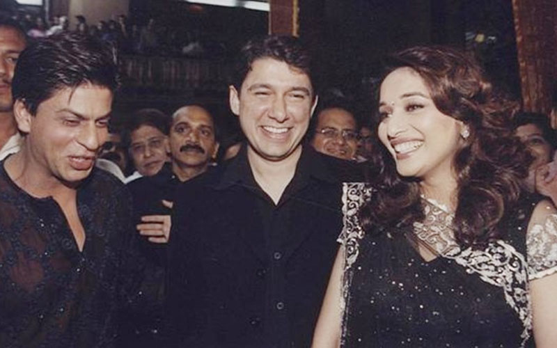 Madhuri with her husband and Shahrukh Khan 